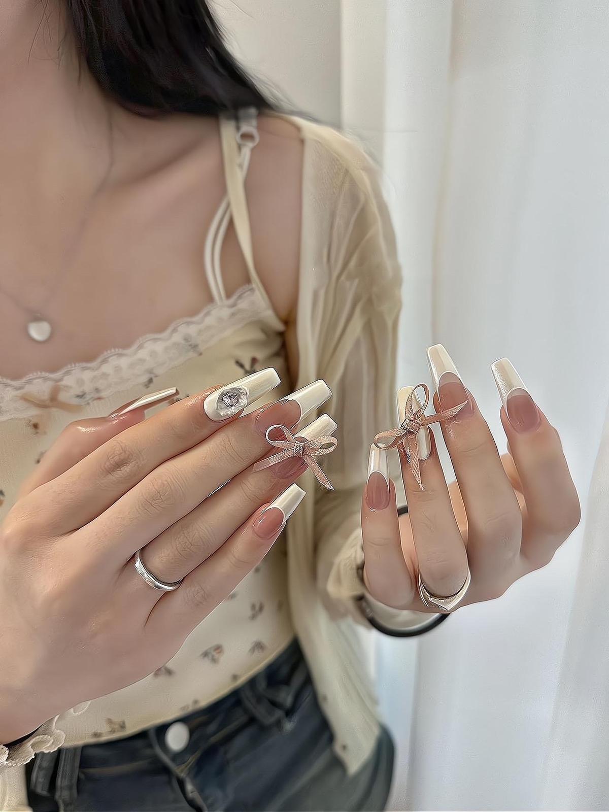 mẫu nail đính nơ đơn giản nhỏ xinh nổi bật