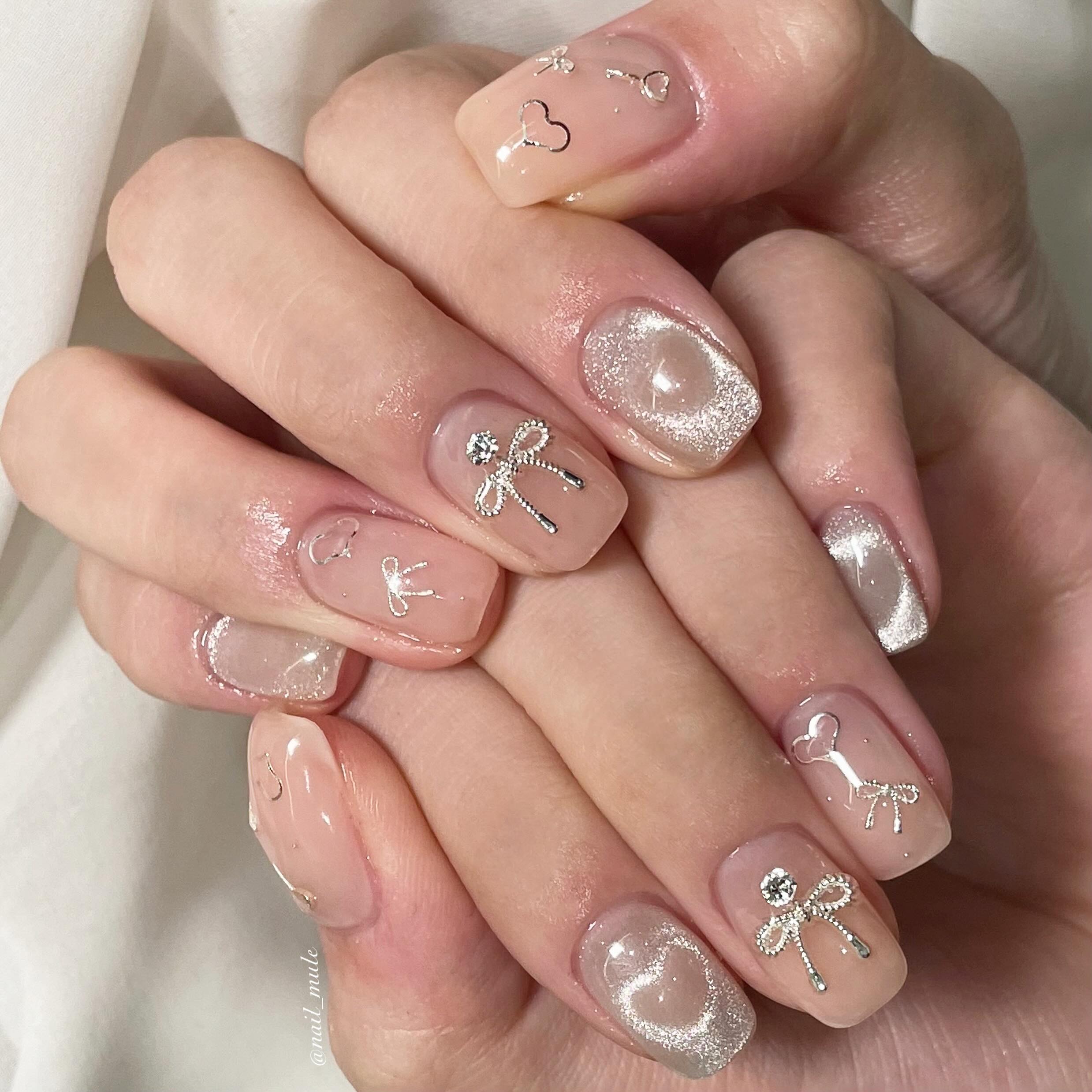 mẫu nail sơn thạch đính nơ trong suốt