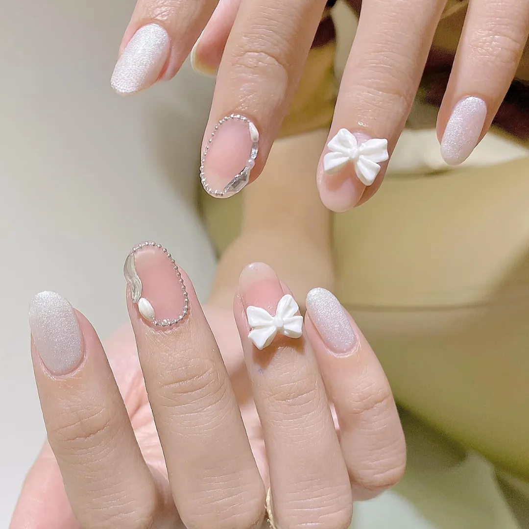 mẫu nail tay ngắn gắn nơ xinh