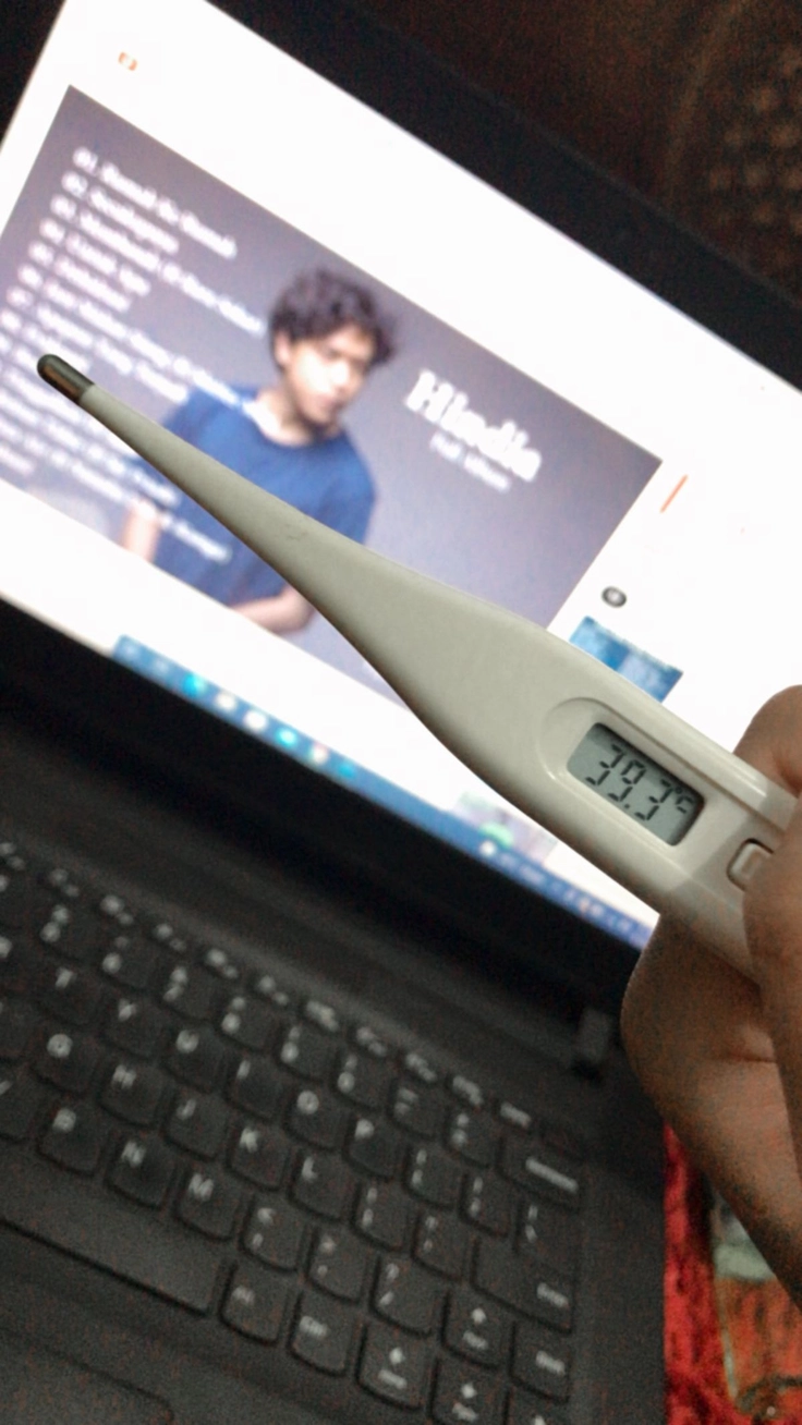 hình ảnh nhiệt kế sốt 39 độ trong nhà 
